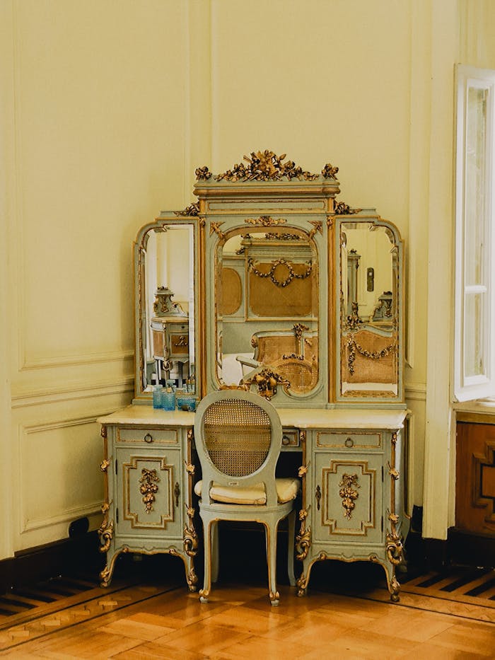 services-03 Ornate vintage dressing table with mirror, capturing luxury and classic design.